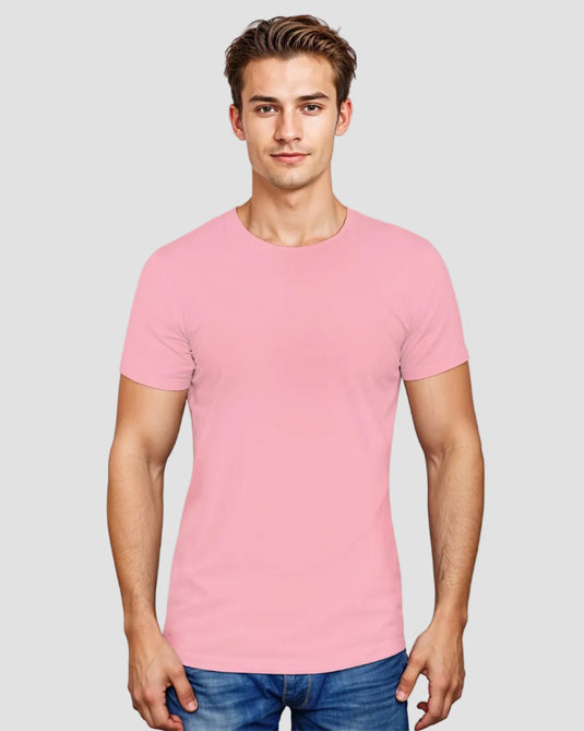 A man wearing a pink slim-fit T-shirt with a round neckline.
