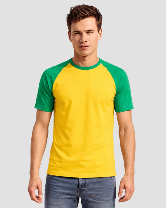 Man wearing a yellow and green baseball shirt on a white background