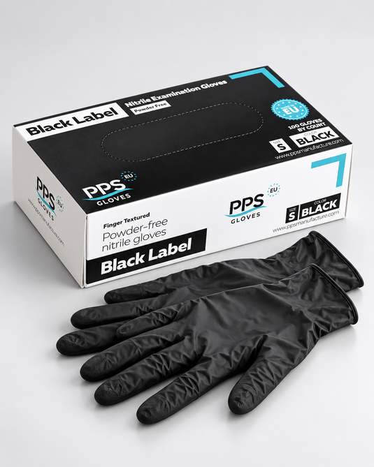A black PPS brand powder-free nitrile glove placed in front of its retail box on a light gray studio background. The box is white and black with blue accents and reads 'Black Label' and 'Fingerless Powder-free nitrile gloves.