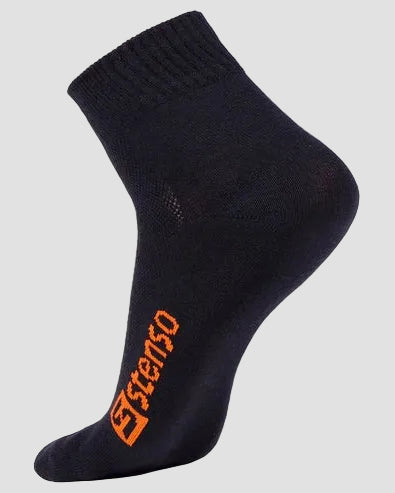 A single navy blue ankle sock with a bright orange 'ESTRENO' logo printed vertically on the side, shown against a light gray background.