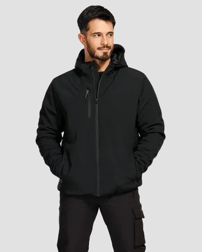 Man wearing a black jacket on a light gray background